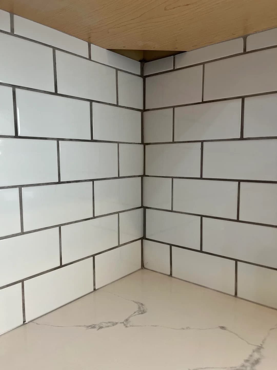 Corner alignment inconsistency in subway tile installation
