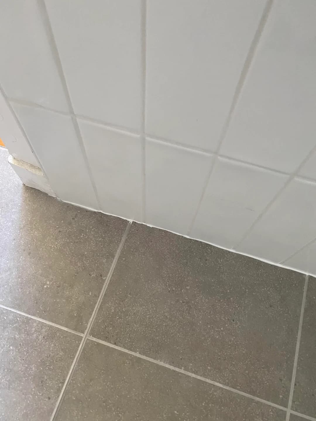 Inconsistent finish detail at wall base