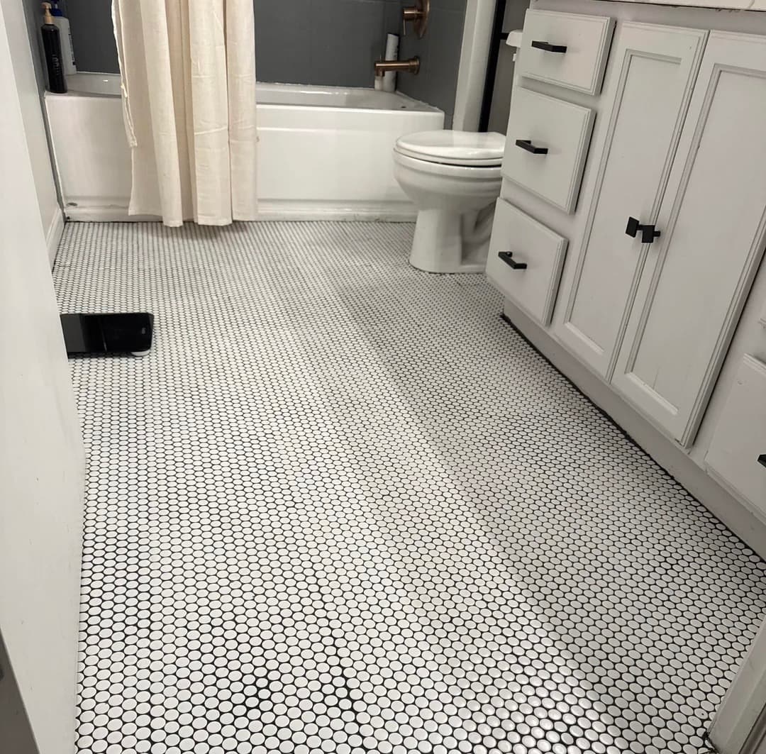 Unresolved transition between tile and adjacent flooring