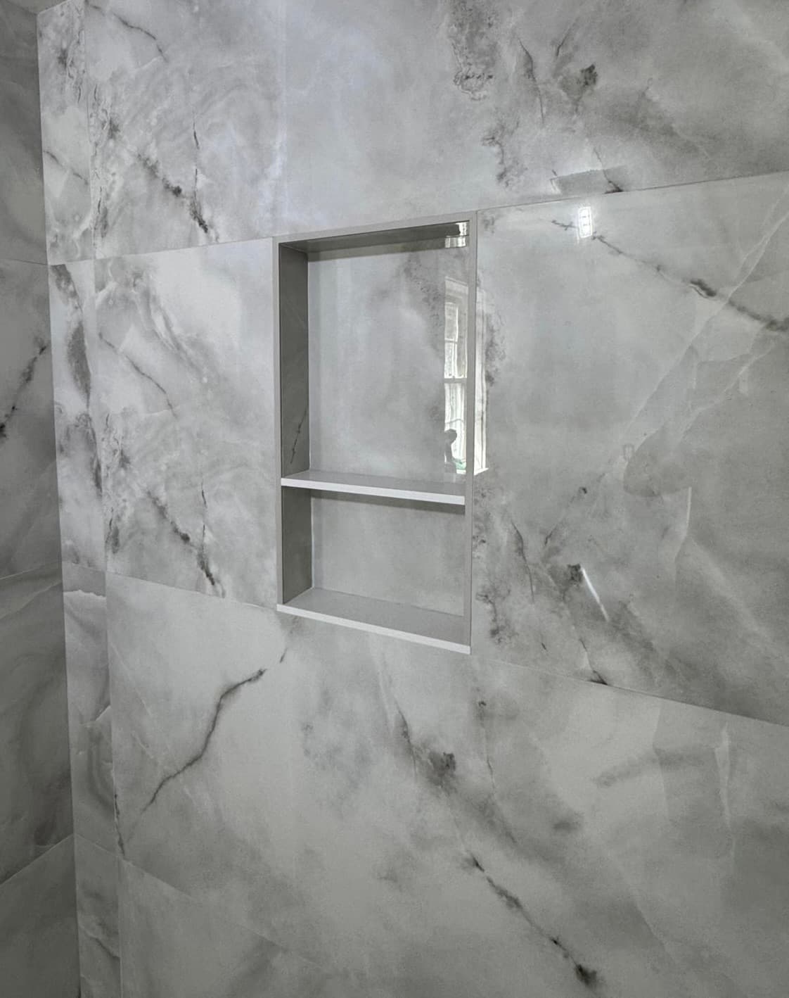 Cleanly aligned marble niche detail